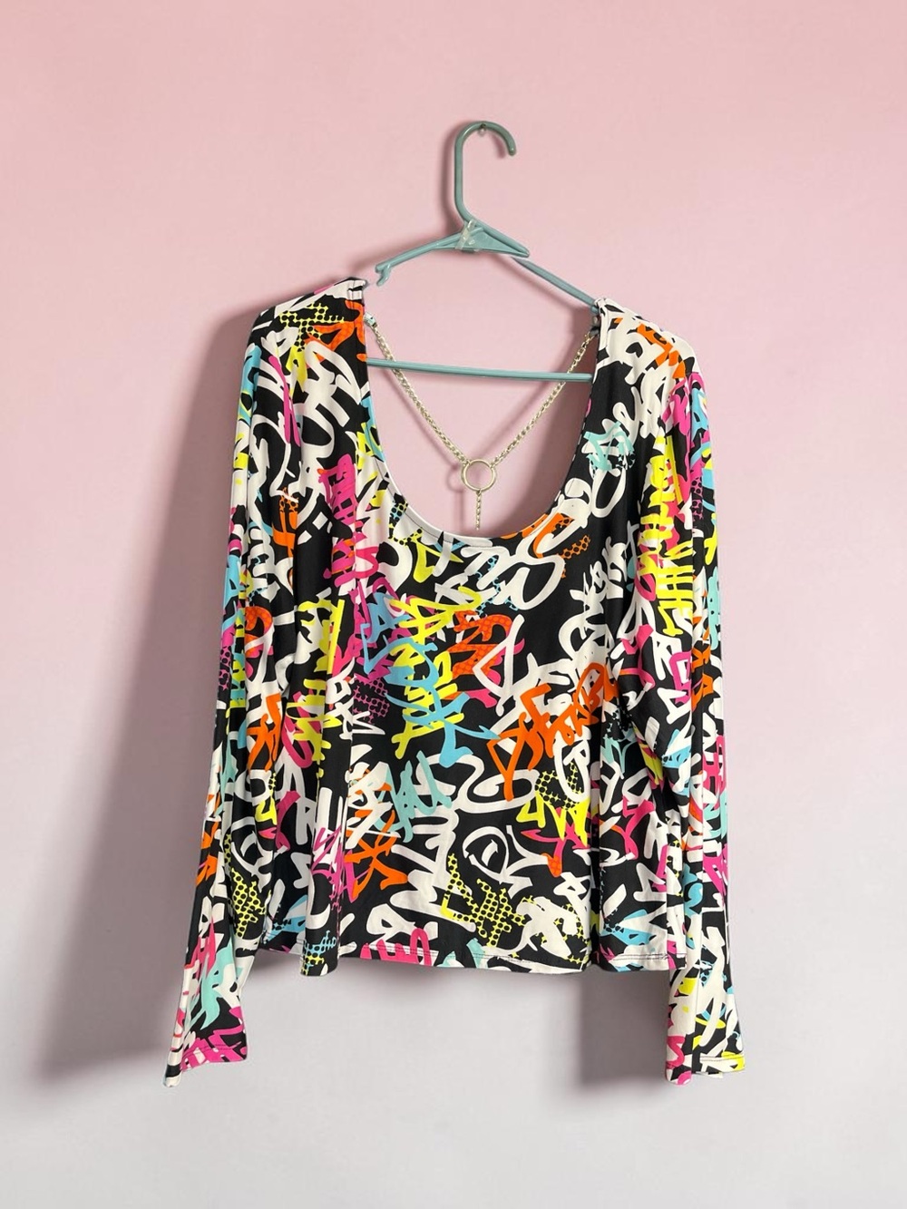 Derek Heart Black Long Sleeve Graffiti Print Top with Multicolor Accents